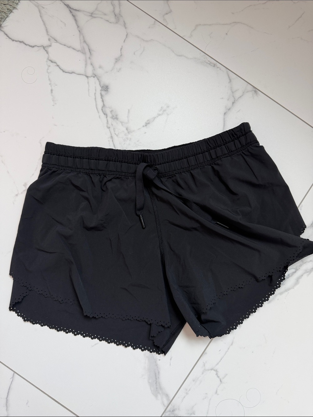 Lululemon Black Women's Shorts with Elastic Drawstring size 4